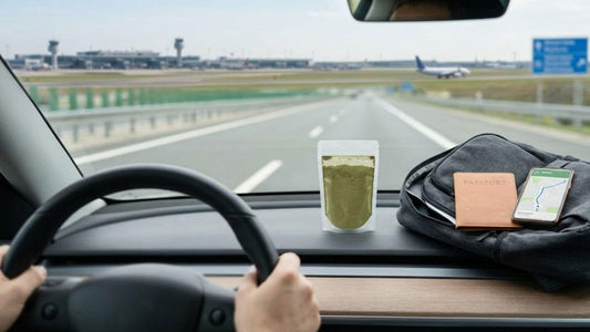 Bag of kratom powder on car dashboard near airport